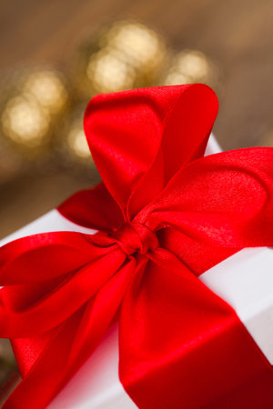 Gift box with red ribbon, Holiday Christmas background