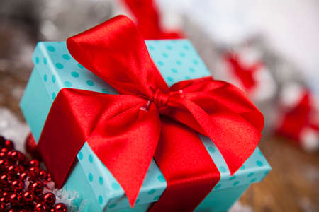 Gift box with red ribbon, Holiday Christmas backgroundの写真素材