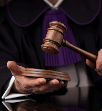 Courtroom, Judge, male judge in black mirror backgroundの写真素材