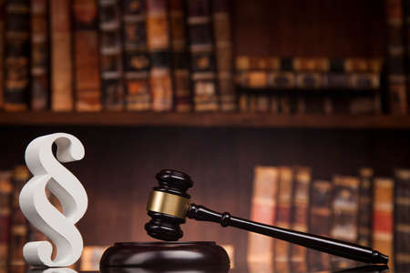 Paragraph, law and justice concept, wooden gavel, mirror backgroundの写真素材