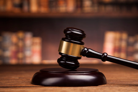 law theme, mallet of the judge, justice scale, books, wooden deskの写真素材