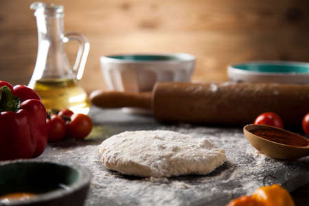 Fresh an tasty homemade pizza preparationの写真素材