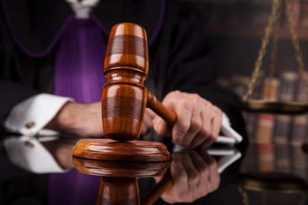 Courtroom, Judge, male judge in black mirror backgroundの写真素材