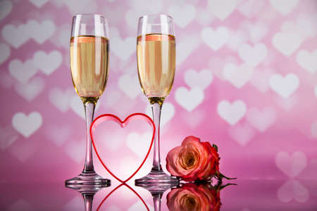 Valentines day background with champagne and roses, mirror backgroundの写真素材