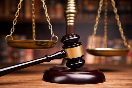 Judge gavel and scales of justice and book backgroundの写真素材