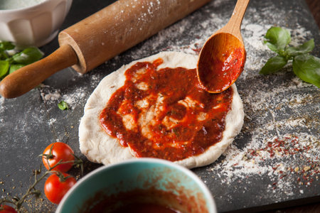 Homemade italian pizza preparationの写真素材