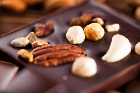 Cocoa pod and chocolate bar and food dessert backgroundの写真素材