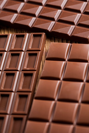 Bars Chocolate , candy sweet, dessert food on wooden background