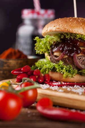 Closeup of homemade hamburger with fresh vegetablesの写真素材