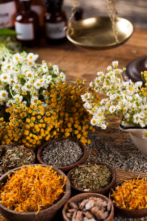 Natural medicine on wooden table backgroundの写真素材