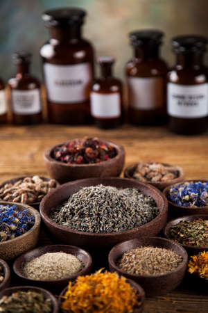 Herbal medicine on wooden desk backgroundの写真素材