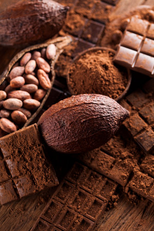 Dark and milk chocolate bar on a wooden table