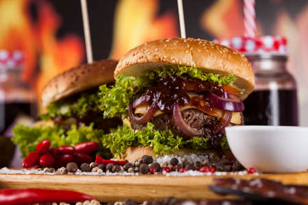 Home made hamburge, wooden desk backgroundの写真素材