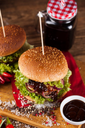 Home made hamburge, wooden desk backgroundの写真素材