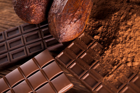 Chocolate sweet, cocoa pod and food dessert background