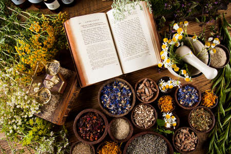 Natural medicine on wooden table backgroundの写真素材