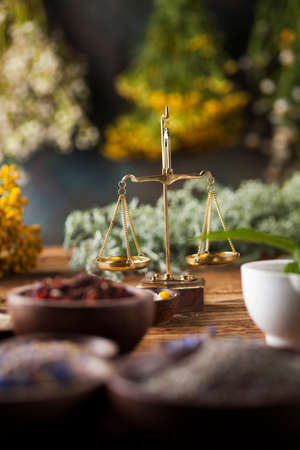 Herbal medicine on wooden desk backgroundの写真素材