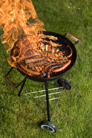 Assorted grilled meat on a summer barbecue, BBQ concept