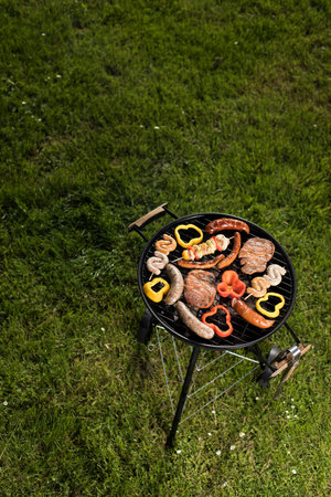 Assorted grilled meat on a summer barbecue, BBQ concept