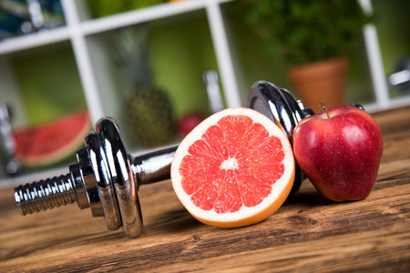 Diet and fitness, dumbbell with vitaminの写真素材