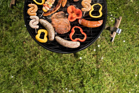 Grill with red hot briquettes, fire backgroundの写真素材