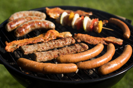 Grill with red hot briquettes, fire background
