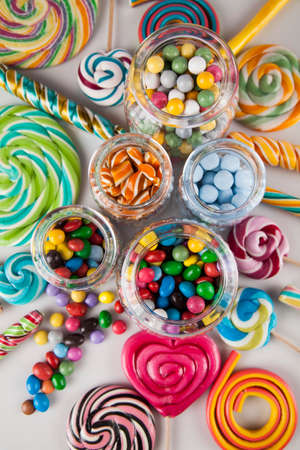 Lollipops and sweet candies of various colorsの写真素材