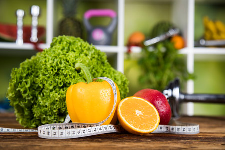 Diet and fitness, dumbbell with vitaminの写真素材