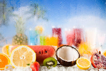 Cocktails in front of beach and seaの写真素材