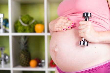Pregnancy, healthy food and people conceptの写真素材