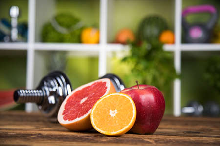 Diet and fitness, dumbbell with vitaminの写真素材