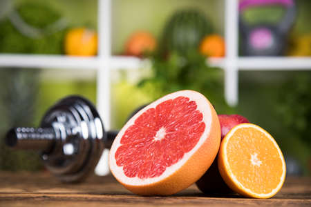 Diet and fitness, dumbbell with vitaminの写真素材