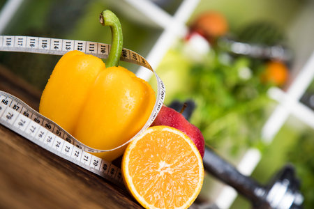 Diet and fitness, dumbbell with vitaminの写真素材