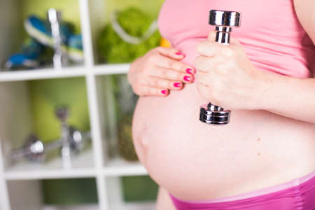 Fitness Pregnancy woman, healthy lifestyle conceptの写真素材
