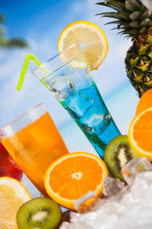 Summer drink with blur beach on backgroundの写真素材