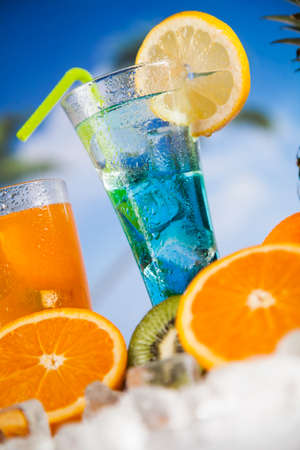 Summer drink with blur beach on backgroundの写真素材