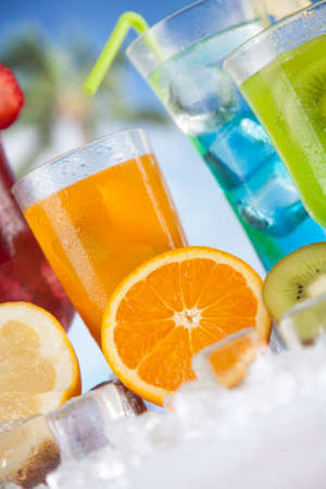 Summer drink with blur beach on backgroundの写真素材