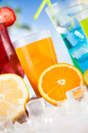 Summer drink with blur beach on backgroundの写真素材