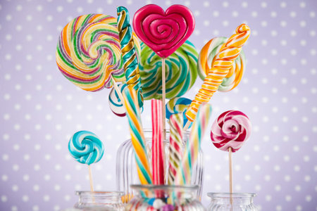 Glass jars in Colorful candies,lollipops and gum balls