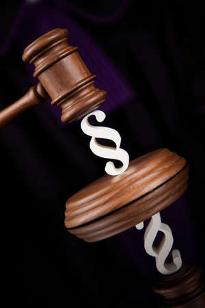 Striking mallet, Judgment concept, book background and Paragraphの写真素材