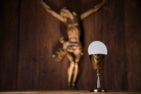 Eucharist symbol of bread and wine, chalice and host, First communion background