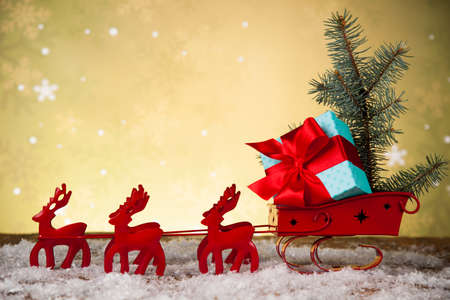 Christmas, Santa sleigh on gift box backgroundの写真素材