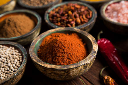 Spices over wooden backgroundの写真素材