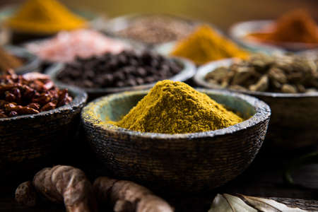 Spices over wooden backgroundの写真素材