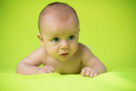 Crawling baby boyの写真素材