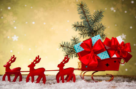 Christmas, Santa sleigh on gift box backgroundの写真素材