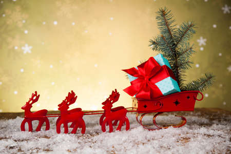 Christmas, Santa sleigh on gift box backgroundの写真素材
