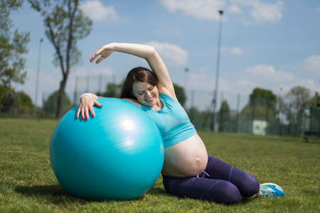 Fitball in the gym, Pregnant womanの写真素材