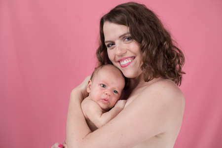 Cute portrait of mother and babyの写真素材