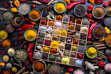 Close-up of different types of Assorted Spices in a wooden boxの写真素材